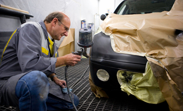 man buffing car